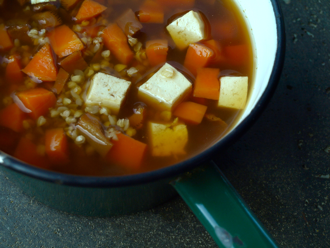 Japanese buckwheat soup with tofu, carrot and mushroom